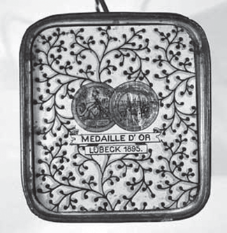 Medaille D'Or Lubeck Sewing Machine Tin