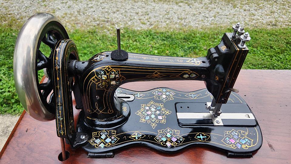 Singer New Family Sewing Machine adorned with Mother of Pearl