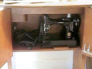 Singer's Number 68 Featherweight Sewing Machine Cabinet