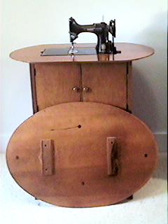 Singer's Number 68 Featherweight Sewing Machine Cabinet