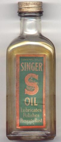 Front of Newer Style Singer Oil Bottle with Screw-On Lid