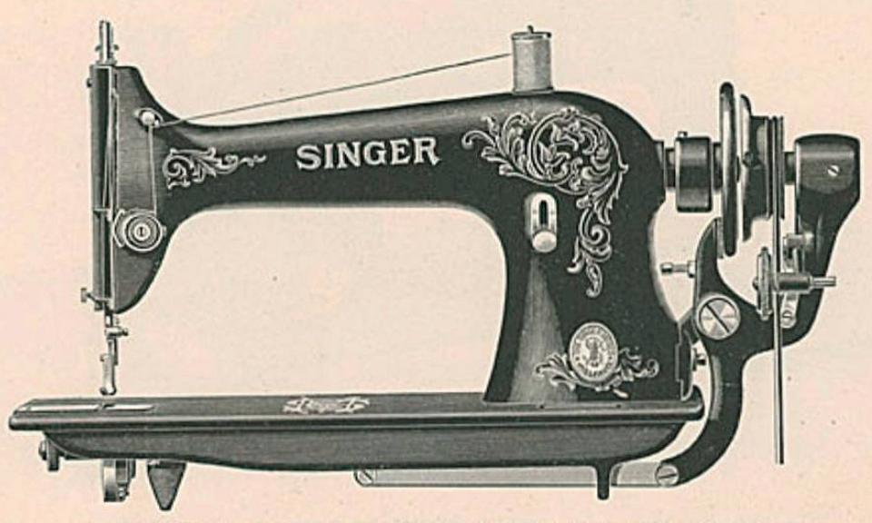 The Singer Model 31-3 with the attached Singer Driving Attachement