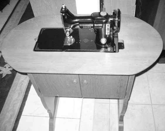 The Model 68 cabinet setup and ready to sew
