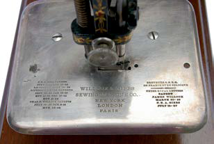 Willcox and Gibbs Glass Disc Sewing Machine Stitch Plate.