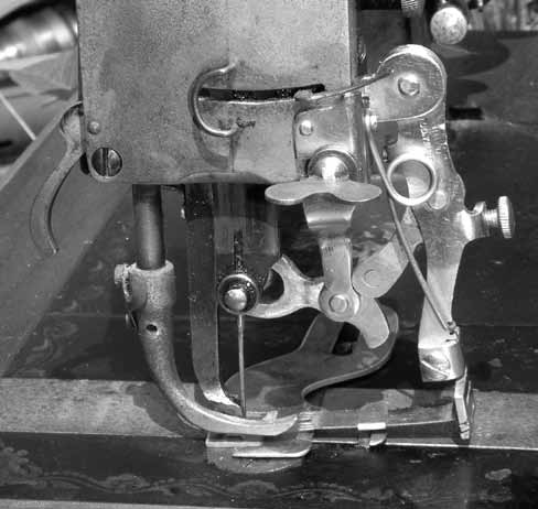 A ruffler attachment on a Davis Vertical Feed Sewing Machine
