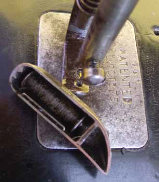 Needle plate and shuttle of Hillman's Sewing machine