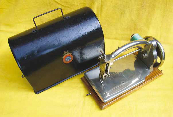 Ideal Sewing Machine with its sheet-steel cover