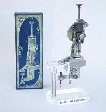 German Moldacot Sewing Machine with Blue Storage Tin