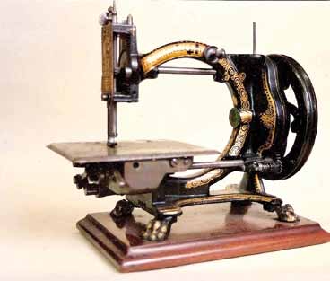 Standard Shakespear sewing machine of the 1870s, on its wooden base