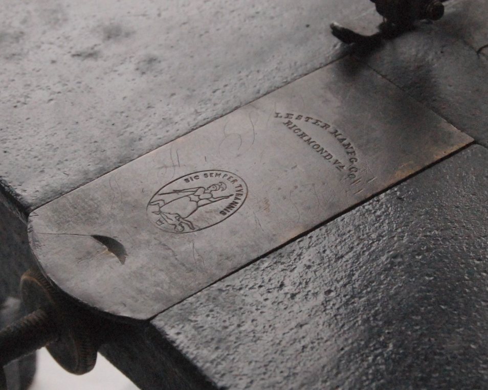 Lesters sewing machine made in Richmond, shuttle cover plate with motto of Virginia