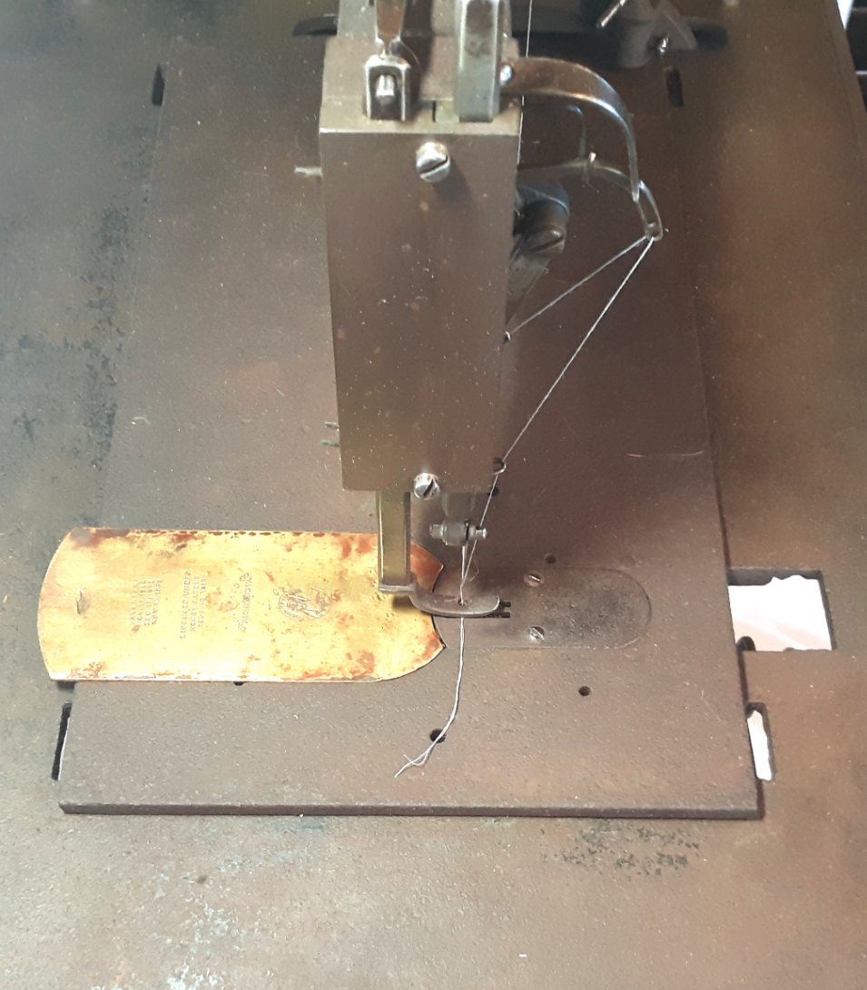 The Union Manufacturing CO sewing machine of Richmond, VA: the head of the arm showing the take-up assembly